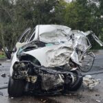 Grave colisão entre carreta e automóvel mata motorista